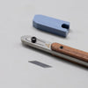 Slim leathercraft knife with replaceable blade, perfect for precision cutting, trimming corners, and fine detail work. Easy to use and swap blades with a hex key. A great tool for clean, controlled cuts. Add it to your leatherworking setup today.