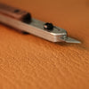 This pen-style knife is a handy little tool for anyone who works on detailed leathercraft. It’s slim, lightweight, and feels more like holding a pen than a knife — which makes it especially good for those fine, careful cuts where control really matters.
