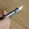 The QiANYU Retro Stainless Steel Craft Knife features a solid 2Cr13 body, HRC 50+ hardness, and a steady, no-wobble design. Ships with a 30° blade pre-installed. Durable, comfortable, and made for precise cutting. Choose your finish and elevate your craft today.