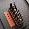 The Bangbang Hex Round Punch Set is made for clean, accurate round holes in leatherwork. It is a practical tool set for belt holes, hardware fitting, decorative holes, and other small leathercraft details where a neat cut really matters.Each punch is made in Taiwan from high-toughness special alloy steel, with a black electroplated finish for better rust resistance and a clean, durable surface. The hex-shaped body gives a steady grip, while the round cutting edge is made for precise, consistent holes.
