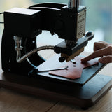 Introducing the Maxita EC-17 Hot Stamp Machine — the ultimate tool for enhancing brand identity on leather goods, EC-27, the EC-17 excels in various hot stamping techniques, including gold and silver foiling, branding, and embossing. Crafted from durable anodized aluminum, this compact machine combines versatility with precision.