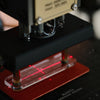 This transparent acrylic holder is perfect for previewing and aligning your design before the final embossing.