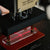 This transparent acrylic holder is perfect for previewing and aligning your design before the final embossing.