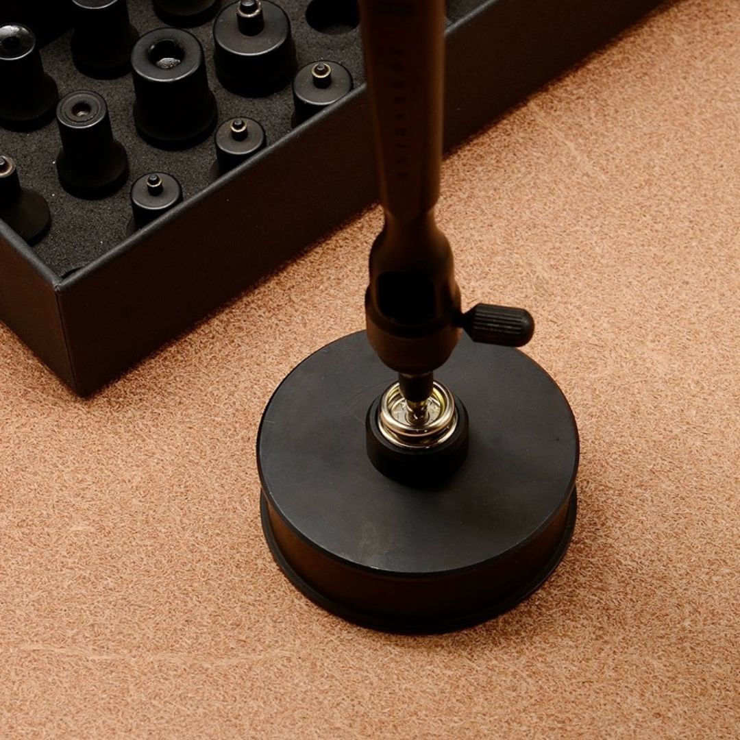 Upgrade your leathercraft with a professional, modular snap-setting tool set. Quick-change heads, universal handle, 440C stainless durability, dual-sided base plate. Compatible with Under the Moonlight Punch Series and THK/PRYM/Alfa snaps for cleaner, faster installs. Order now.