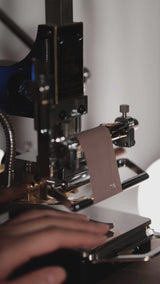 MOVEGO hot foil stamping machine with automatic foil feeding, infrared positioning, horizontal and vertical calipers, and aviation aluminum alloy body. Works with holders for names, logos, and batch stamping on leather, paper, and PVC. Explore MOVEGO for cleaner custom stamping.